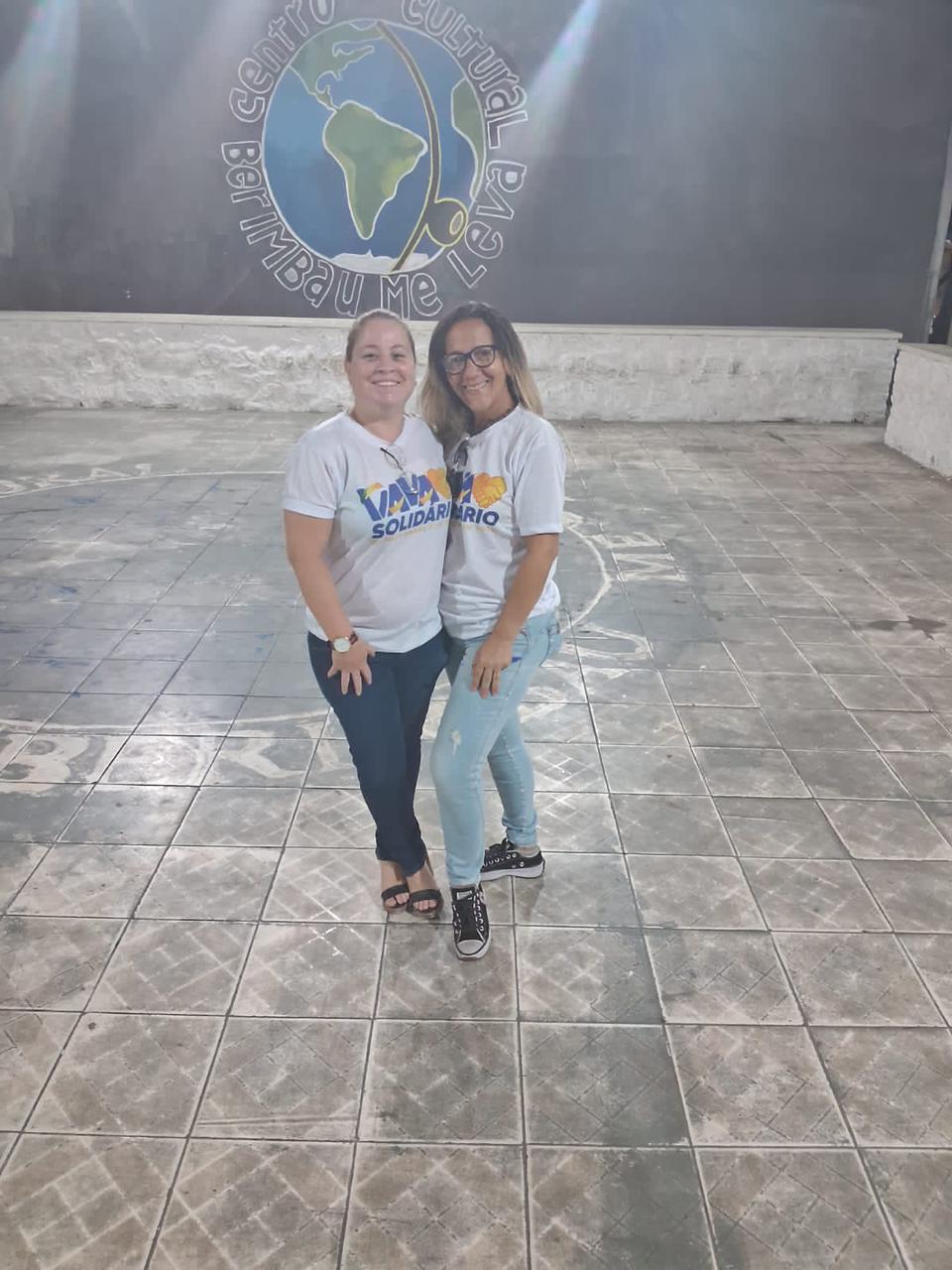 Voluntárias registram o encerramento da campanha